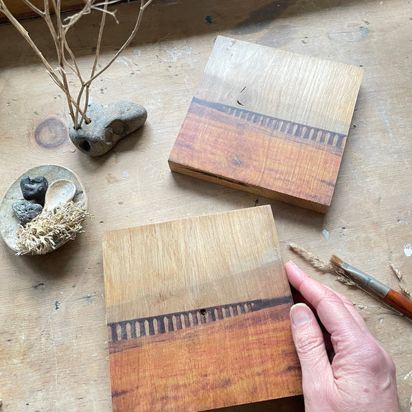 Close up of Oak Abstracted landscape Art being held by Louise W Sharp Artist at Wood Be Loved
